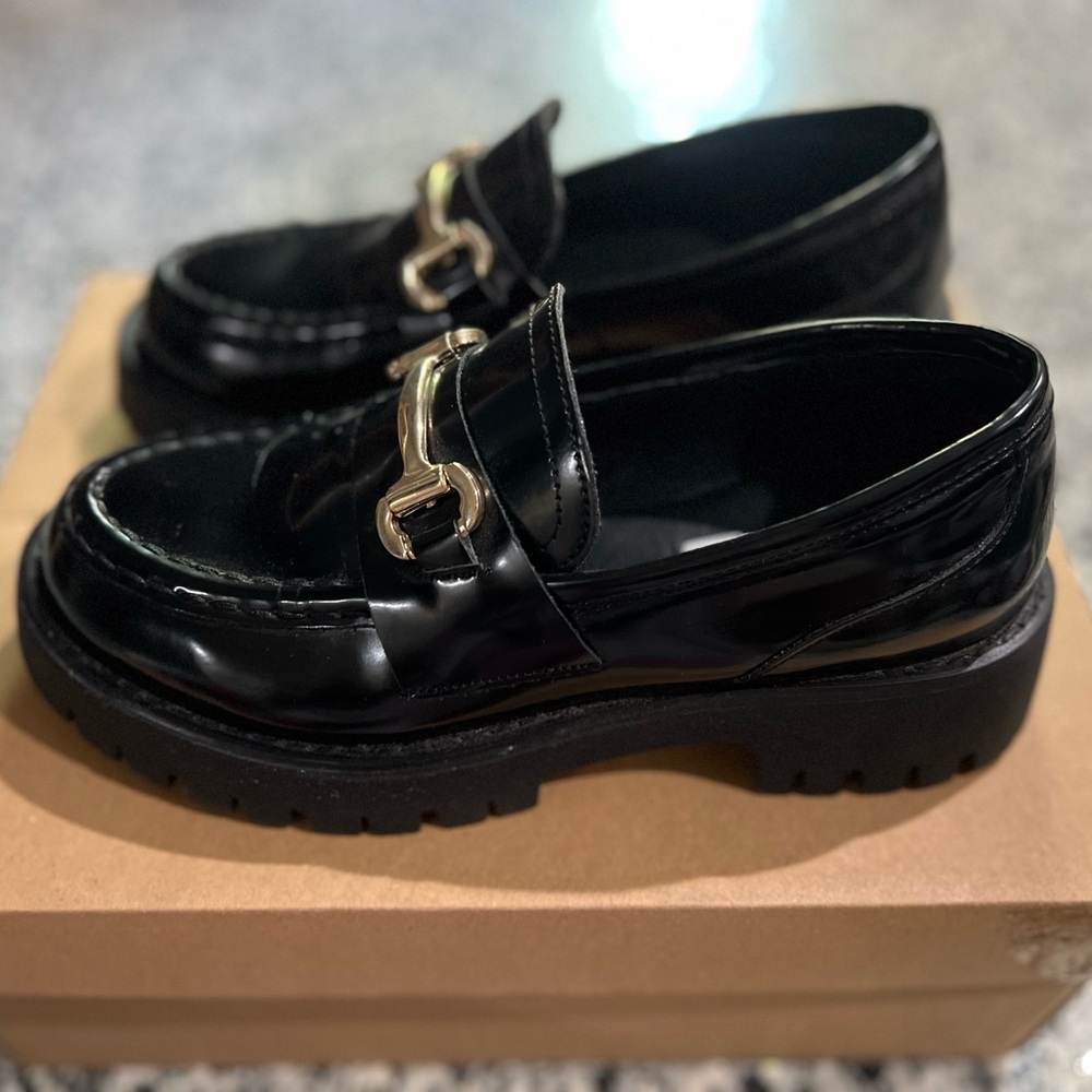 STEVE MADDEN
LANDO BLACK LEATHER